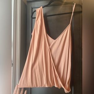 Silence+Noise top, m/l. I wear a 4/6 , 5’5 140lbs 36C and it’s too large on me.